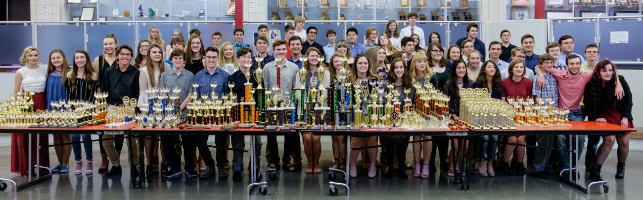 photograph of the 2017 Glendale High School Students with their Speech and Debate Trophies